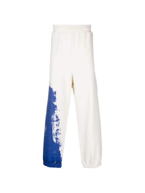 A-COLD-WALL* brush stroke-print track pants
