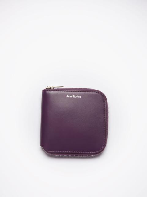 Acne Studios Zippered wallet - Violet purple