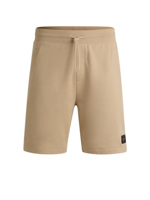 HUGO COTTON-TERRY RELAXED-FIT SHORTS WITH LOGO TRIM