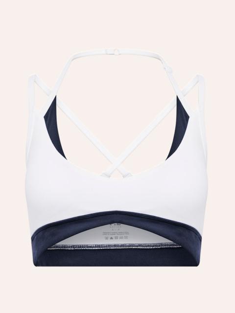 P.E NATION OVERRIDE SPORTS BRA IN WHITE & DARK NAVY