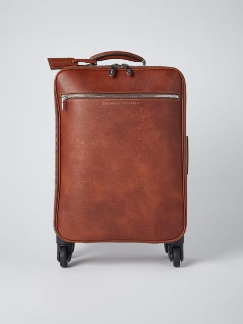 Grained calfskin suitcase