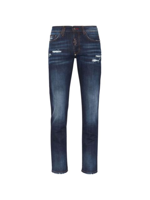 distressed-effect skinny jeans