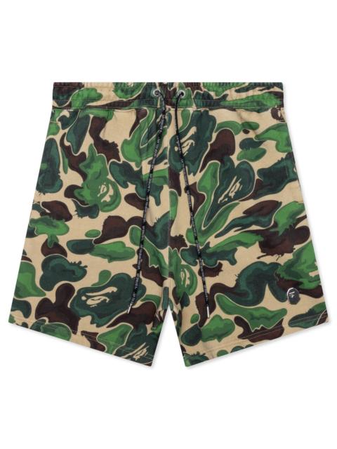 A BATHING APE® BAPE ART CAMO SWEAT SHORTS - GREEN