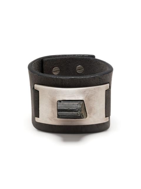 Parts of Four Amulet leather cuff