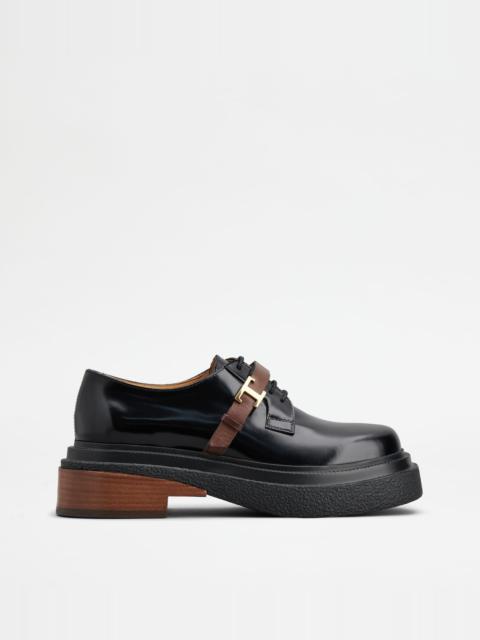LACE-UPS IN LEATHER - BLACK, BROWN