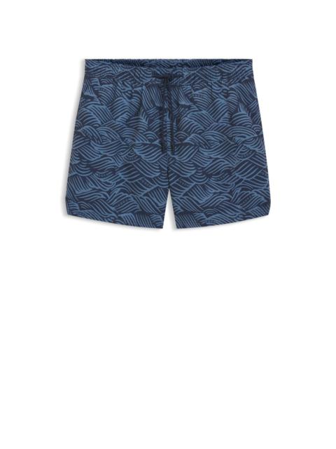 HUGO SWIM SHORTS WITH LOGO ARTWORK