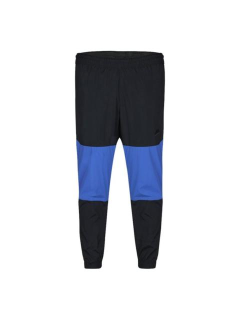 Nike Men's Nike Sportswear Contrasting Colors Athleisure Casual Sports Bundle Feet Long Pants/Trousers Bl