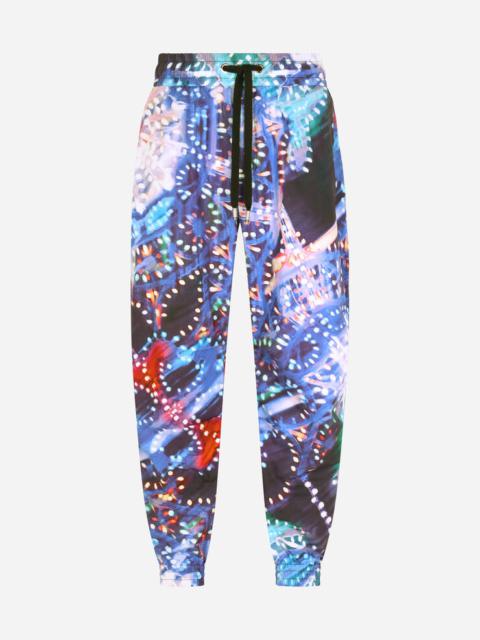 Dolce & Gabbana Cotton jogging pants with illumination print