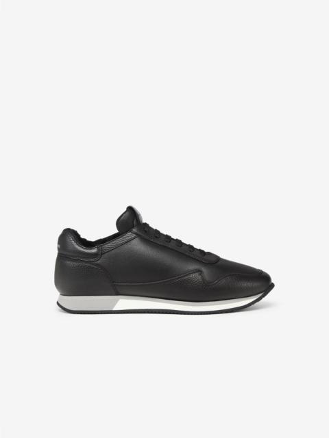 CORNELIANI Black leather runner with shearling lining