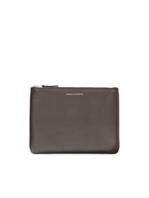 Comme Des Garçons zip clutch bag