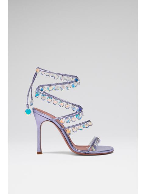 Amina Muaddi TINA LACE UP SANDAL 95 DUSTY LILAC METALLIC NAPPA AND CRYSTAL PENDANTS