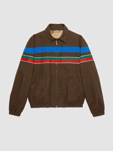 Cotton zip-up jacket with Gucci stripe