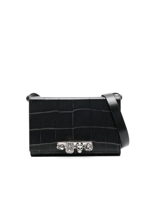 Four Ring leather clutch bag