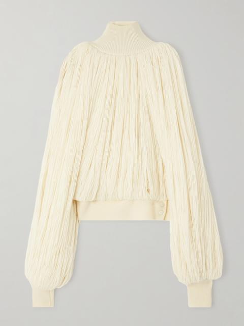 Alaïa Fringed Wool-blend Turtleneck Top