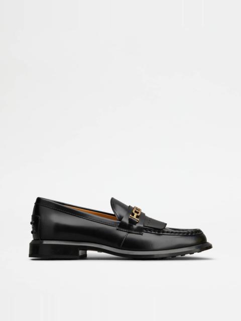 LOAFERS IN LEATHER WITH FRINGES - BLACK