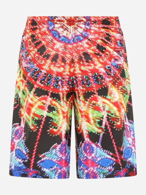 Dolce & Gabbana Long swim trunks with illumination print