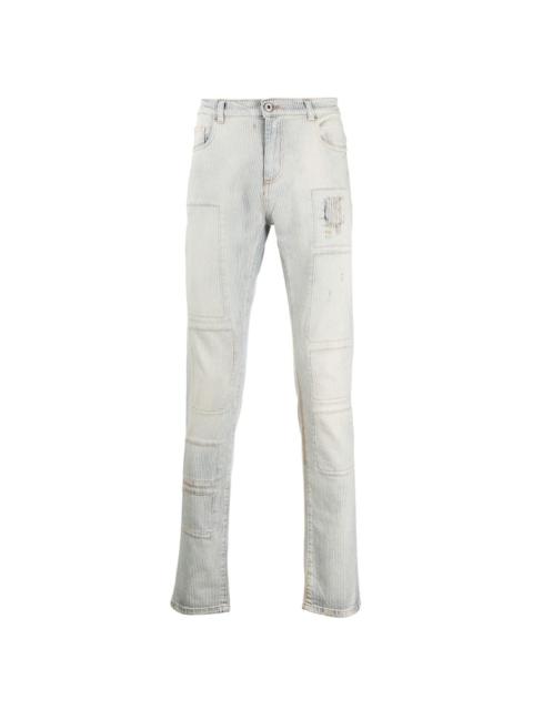 slim-fit stonewashed jeans