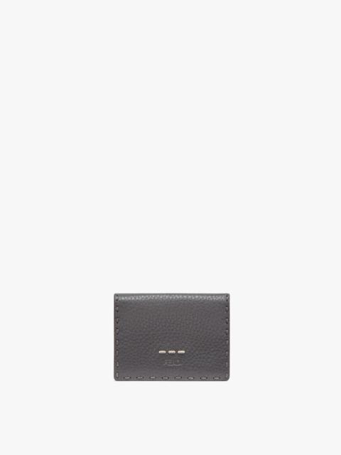 FENDI Wallet with two internal compartments for bank notes and outer pocket with press stud closure. Made 