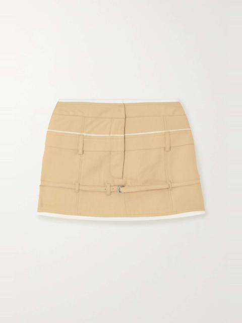 Caraco buckled layered woven mini skirt