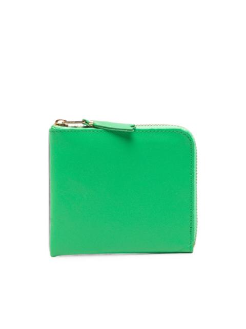 Comme Des Garçons leather wallet