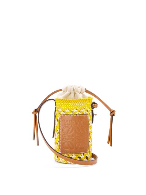 Loewe Cylinder Pocket in iraca palm and calfskin