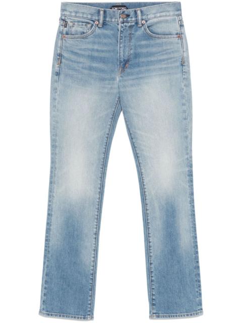 TOM FORD logo-patch tapered jeans