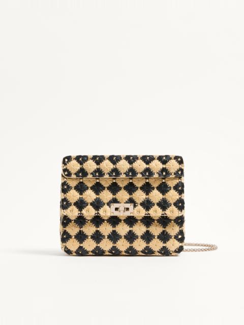 Valentino VALENTINO GARAVANI MEDIUM ROCKSTUD SPIKE BAG EMBROIDERED IN RAFFIA