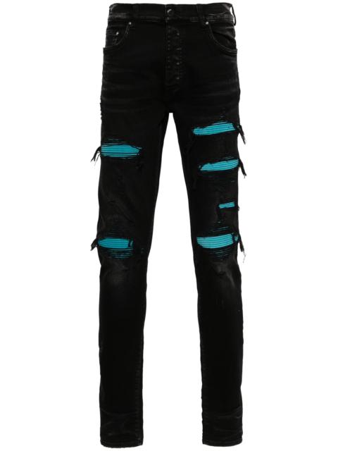 suede-embellished skinny jeans