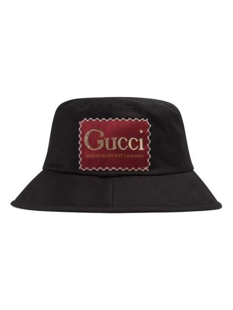 GUCCI Cotton bucket hat with Gucci label