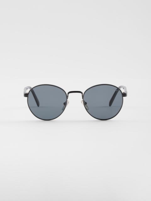 Prada Sunglasses with the iconic metal plaque