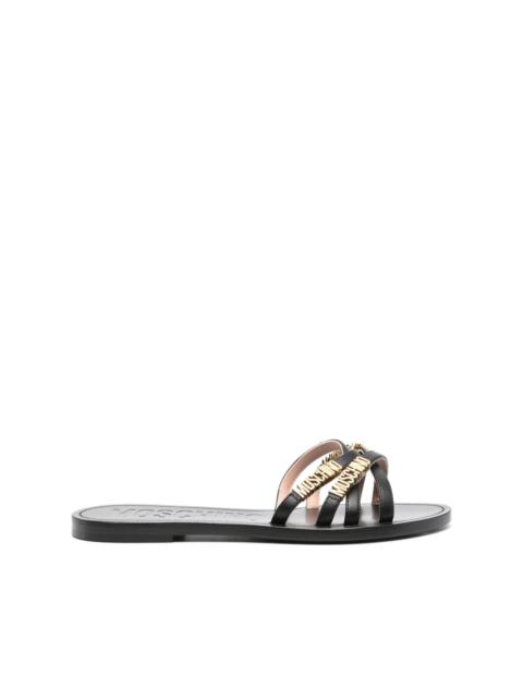 Moschino logo-plaque leather sandals
