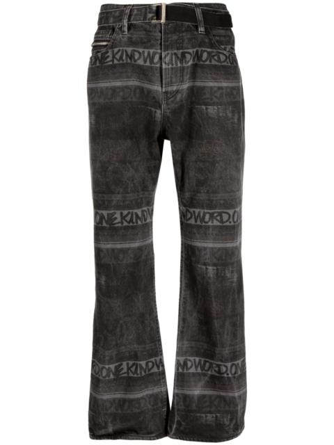 sacai logo-pattern denim jeans