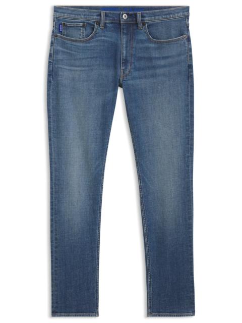 HUGO EXTRA-SLIM FIT JEANS IN MID-BLUE STRETCH COTTON