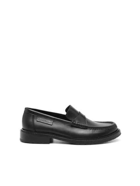 Moschino logo-patch leather loafers