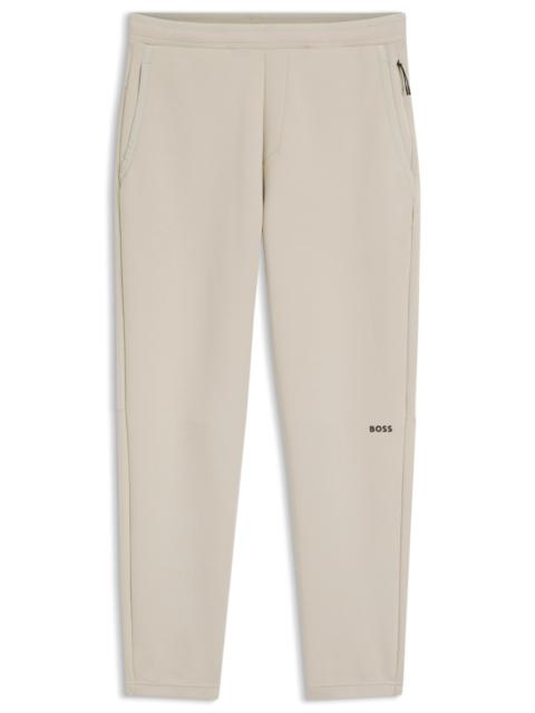 BOSS REFLECTIVE-GRAPHIC TRACKSUIT BOTTOMS IN A COTTON BLEND