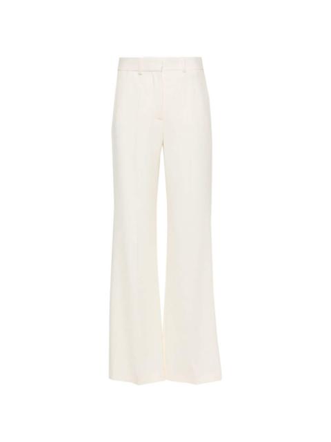 pressed-crease flared trousers