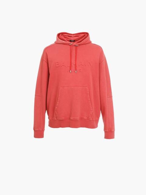 Balmain Faded red cotton hooded sweatshirt with embossed Balmain logo