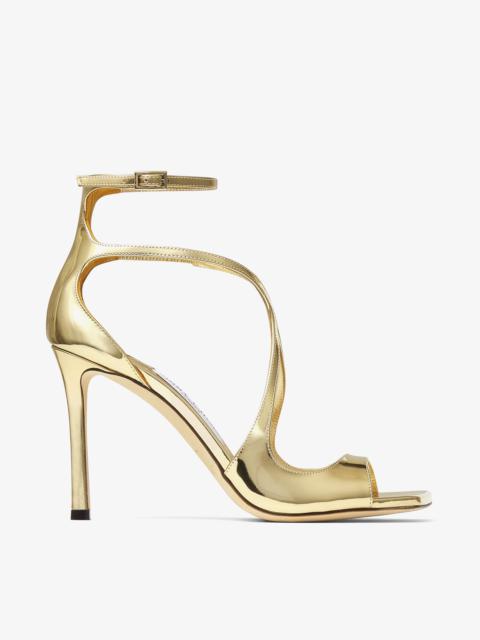 JIMMY CHOO Azia 95
Gold Liquid Metal Leather Sandals