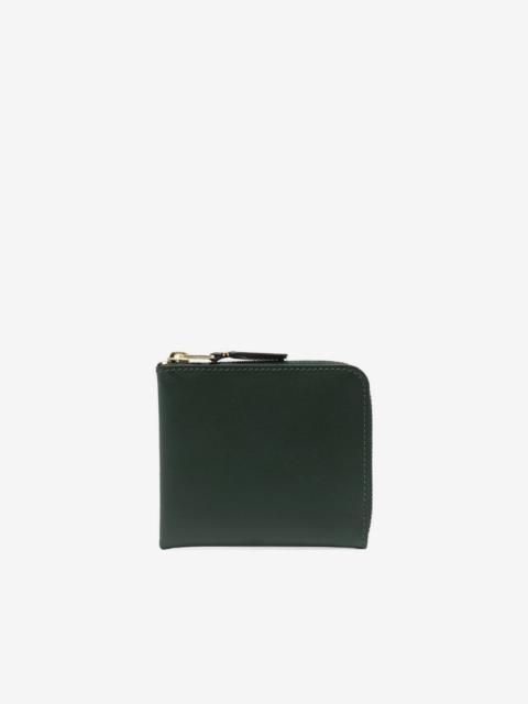 Comme Des Garçons leather zipped wallet
