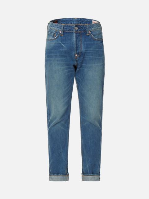 EVISU ALLOVER GODHEAD AND LOGO DISCHARGED  PRINT CARROT-FIT JEANS #2017