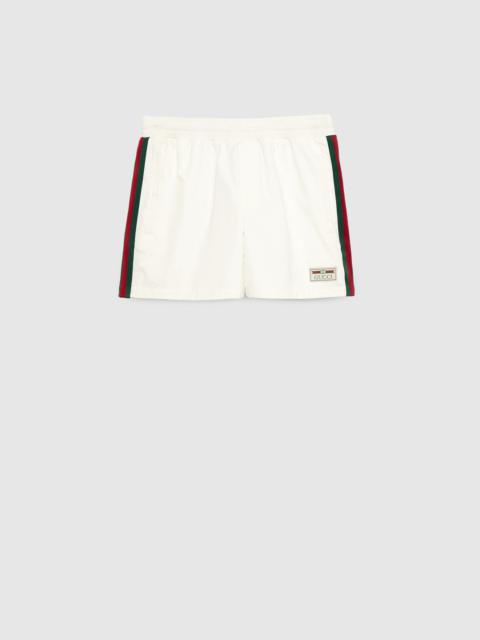 GUCCI Waterproof nylon swim shorts with Web