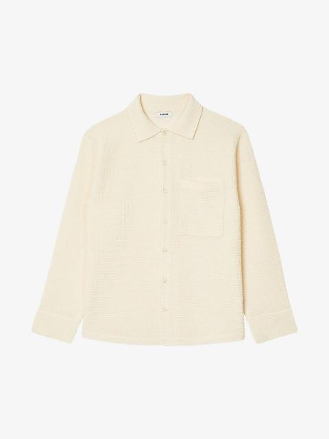 Patch-pocket oversized knitted shirt