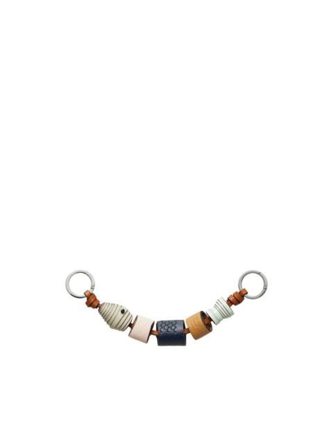 TORY BURCH fish bag charm