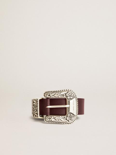Women’s belt in burgundy leather with decorated silver buckle