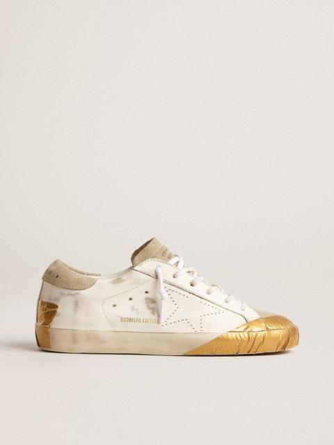 Golden Goose Women's Super-Star LTD in white leather with ice-gray suede inserts and gold-colored tape
