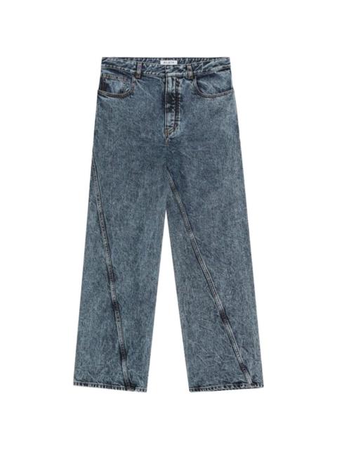 Alaïa twisted stonewashed jeans