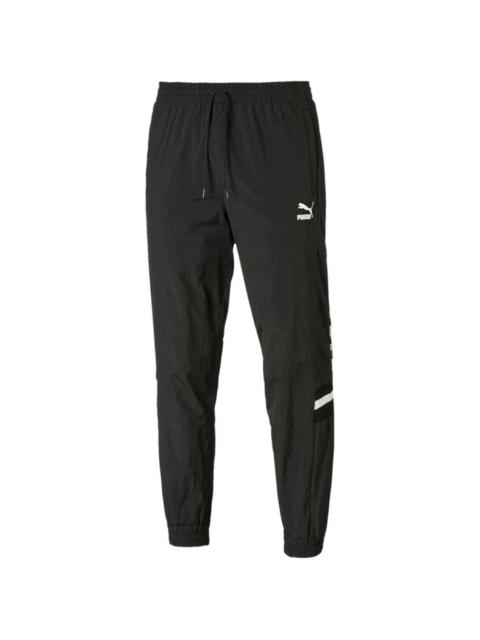 PUMA logo-pirnt track pants