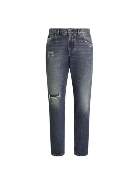 distressed logo-plaque jeans