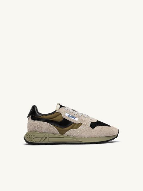 AUTRY REELWIND LOW SNEAKERS IN BLACK, BEACH BLACK AND DRIED HERB SUEDE AND NYLON