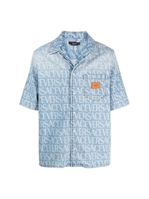 VERSACE Allover logo-print denim shirt